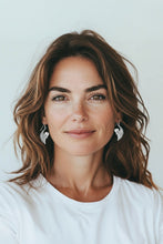 Wings of Grace – Sterling Silver Angel Wing Earrings